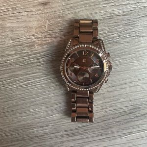 Women’s watch bronze color face and band.
